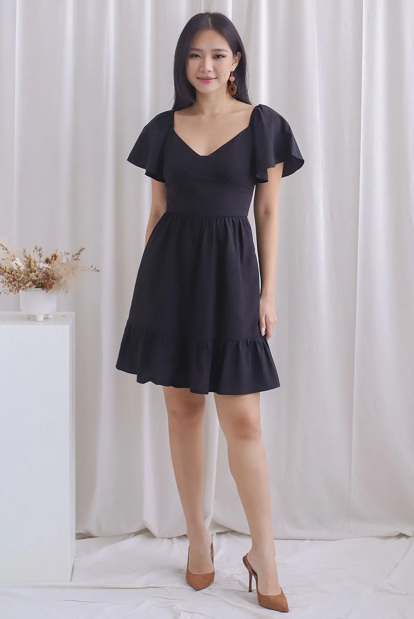 Aenor Bustier Sleeved Ruffle Romper Dress In Black