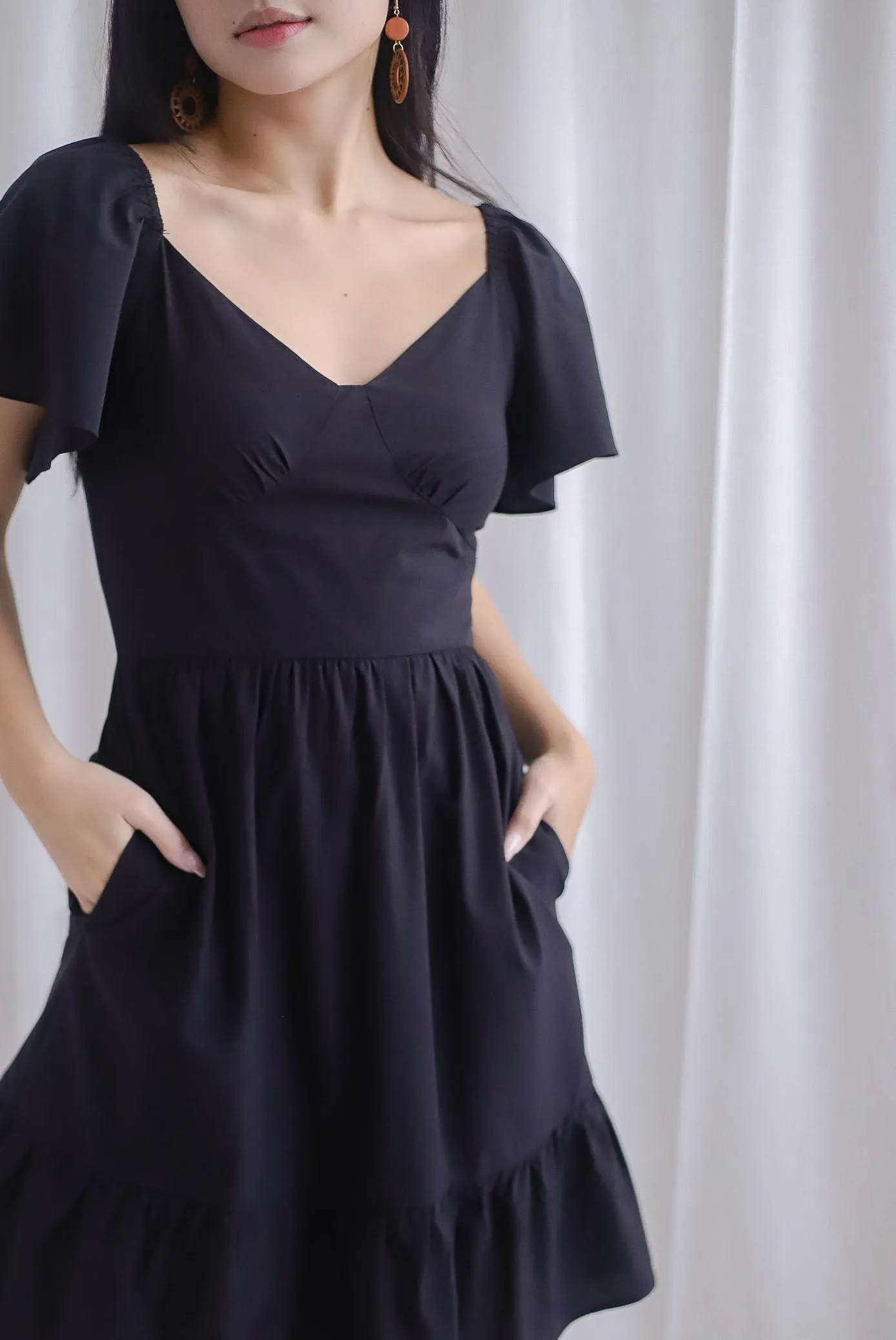 Aenor Bustier Sleeved Ruffle Romper Dress In Black