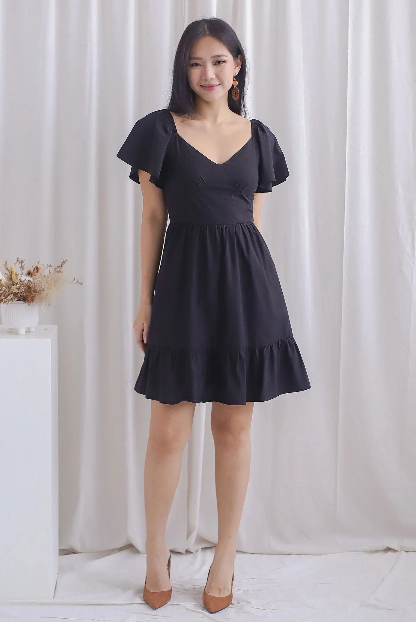Aenor Bustier Sleeved Ruffle Romper Dress In Black