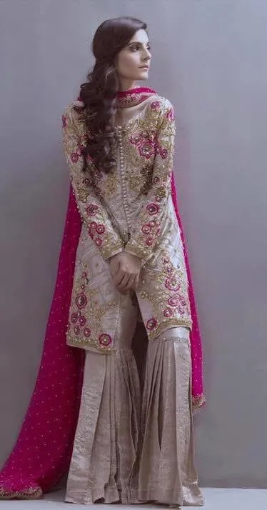 Beautifull gharara set in skin gold and shoking pink color Model#W 887