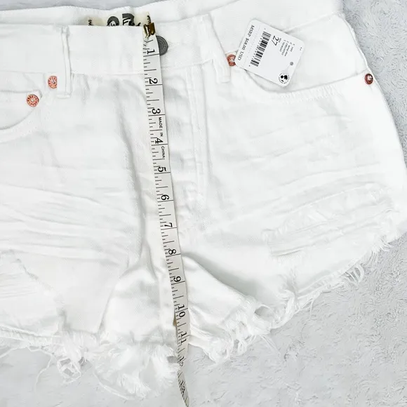 NWT- WE THE FREE Loving Good Vibrations Distressed Denim Shorts Spring White