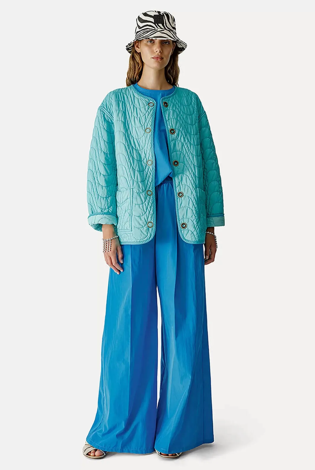 Reversible matelassé bomber jacket