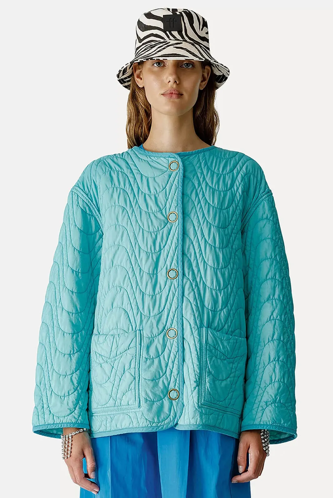 Reversible matelassé bomber jacket