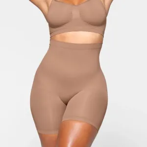 SKIMS Sculpt Seamless Shaping Mid Thigh High Waisted Shorts In Umber